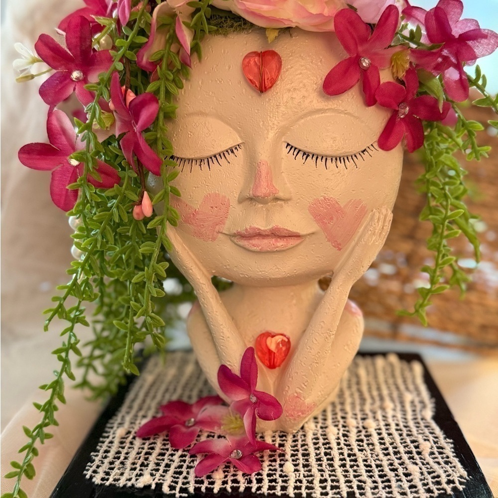 Art Decorative Head Sculpture on stand with Pink Silk Flower Accents